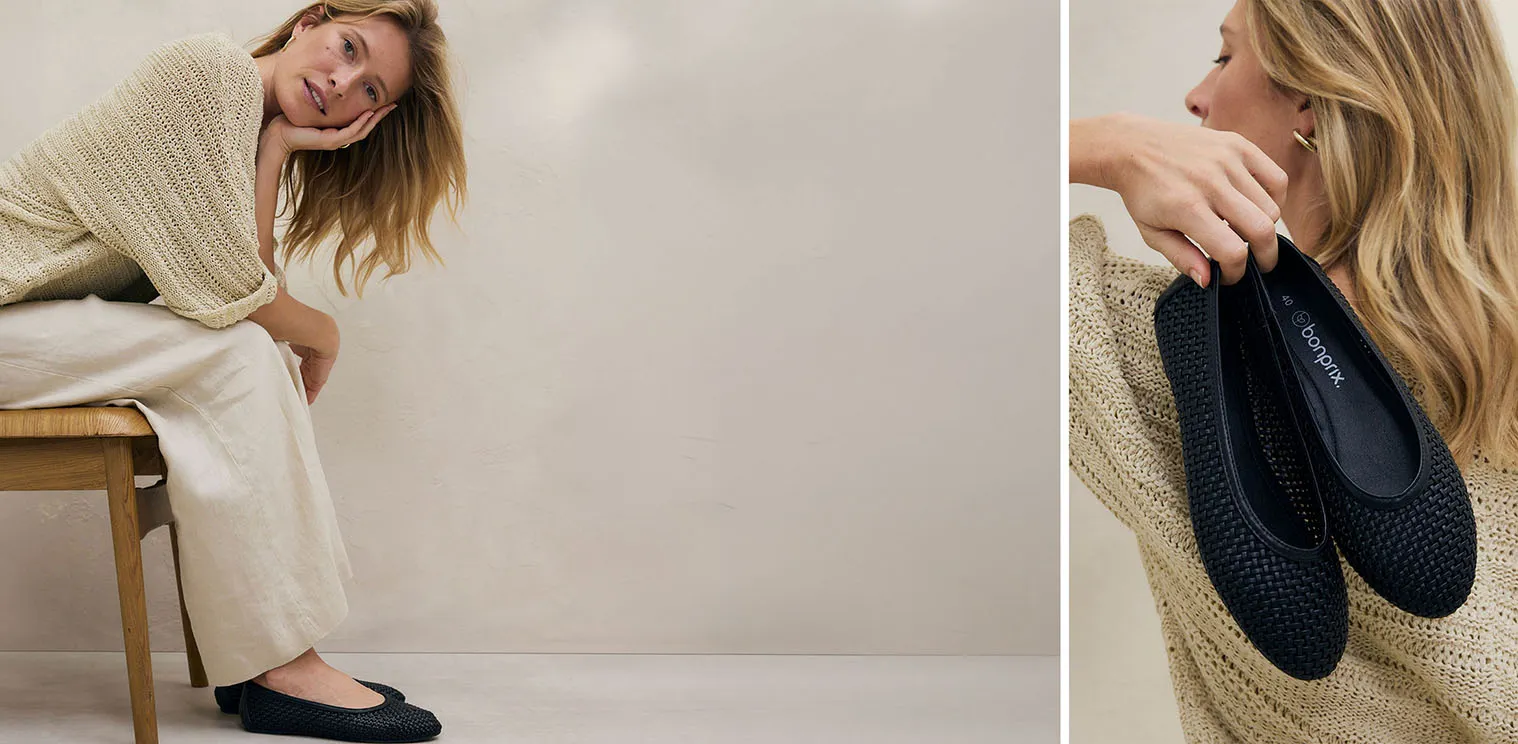 Warme gebreide trui in crème en witte linnen broek zorgen voor een comfortabele, elegante look.