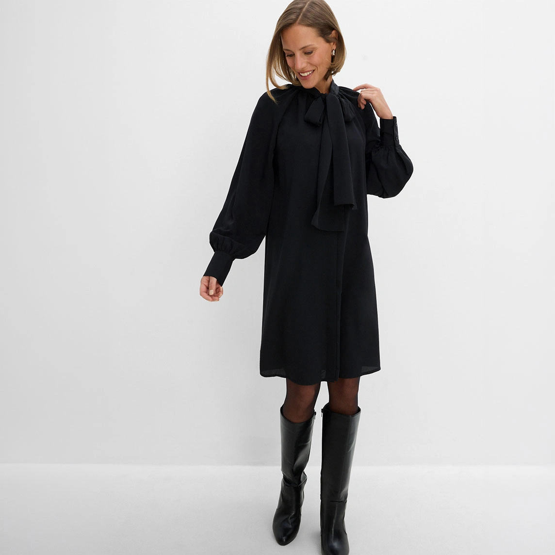 Blousejurk met strik.